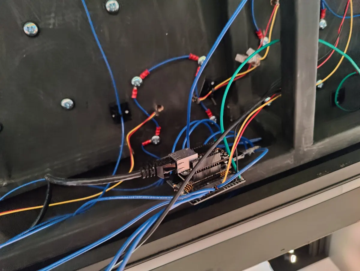 Replacement wiring and a small controller mounted inside an exhibit table