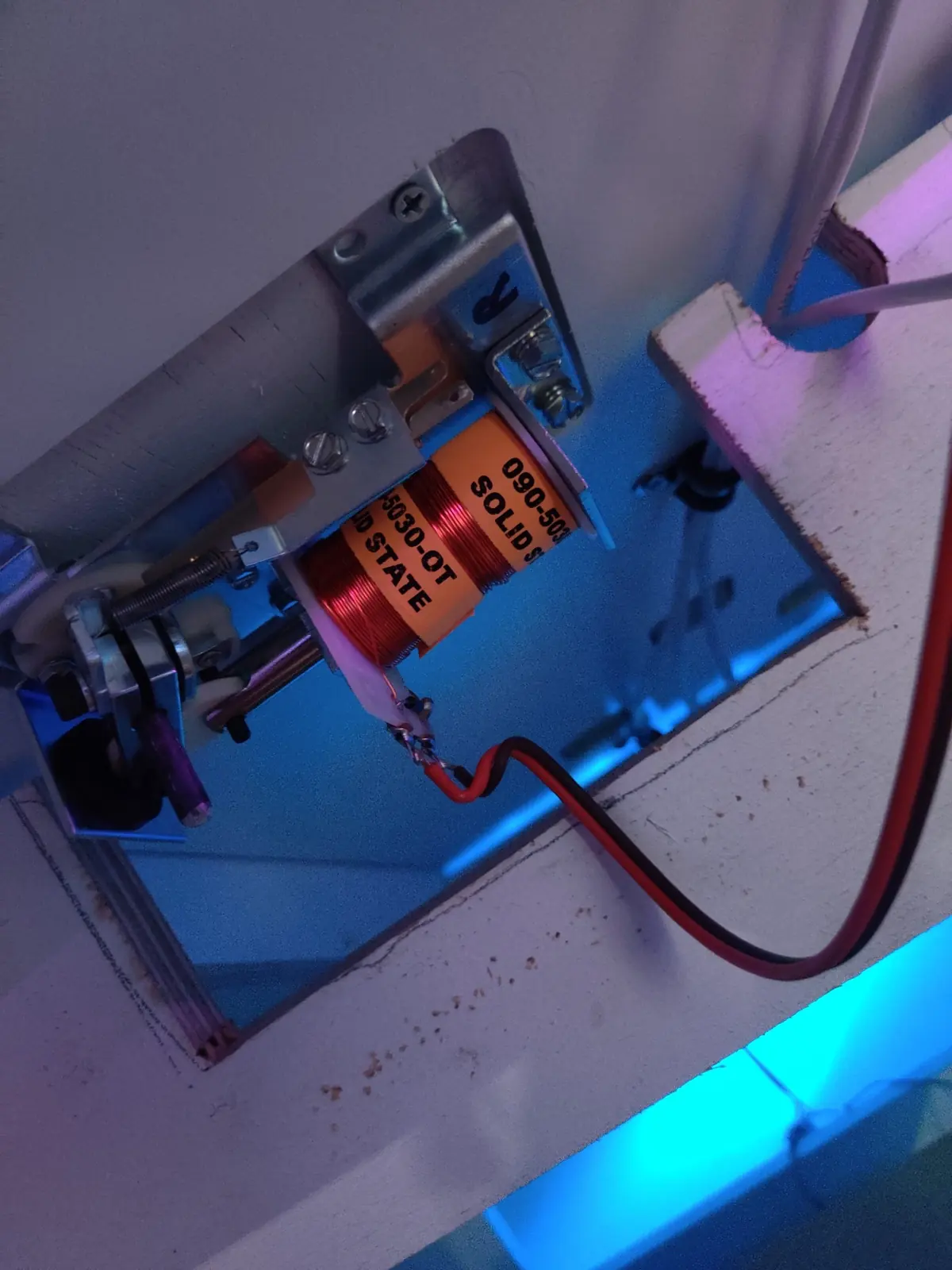 A flipper solenoid squeezed into a cutout too small for it